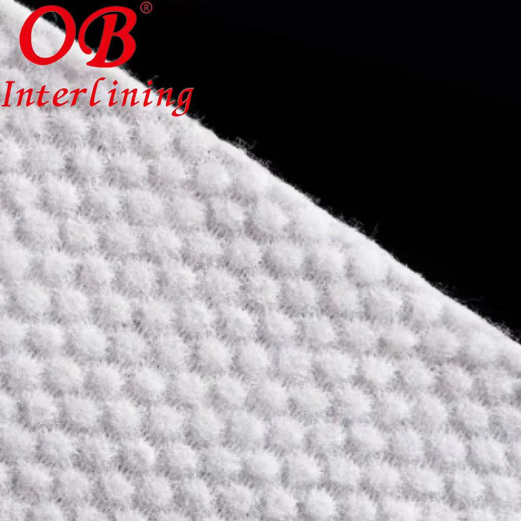 Vải không dệt spunlace vân ngọc trai bán chéo